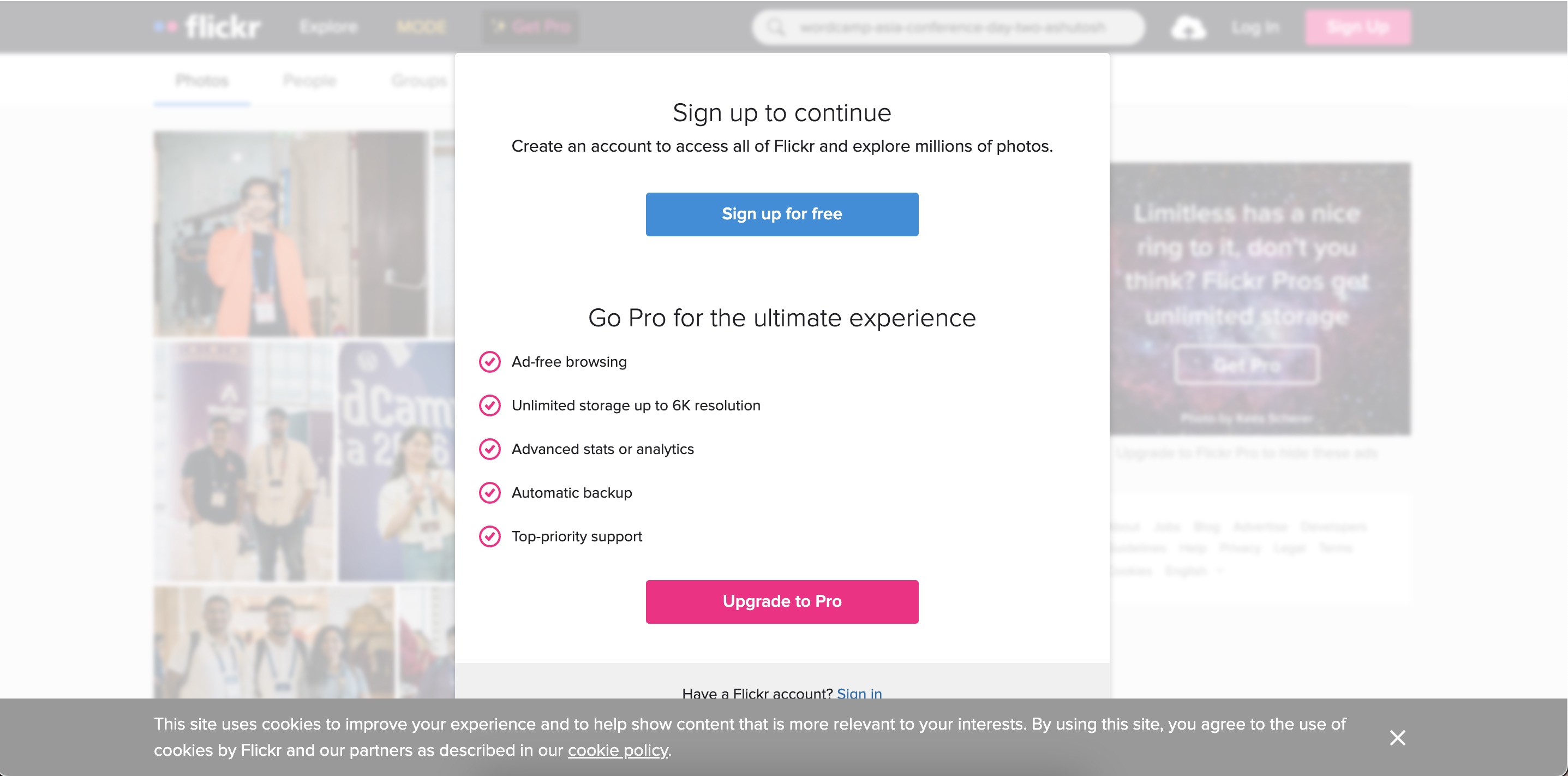 Screenshot showing Flickr alert to sign up or log in after scrolling through a set of images